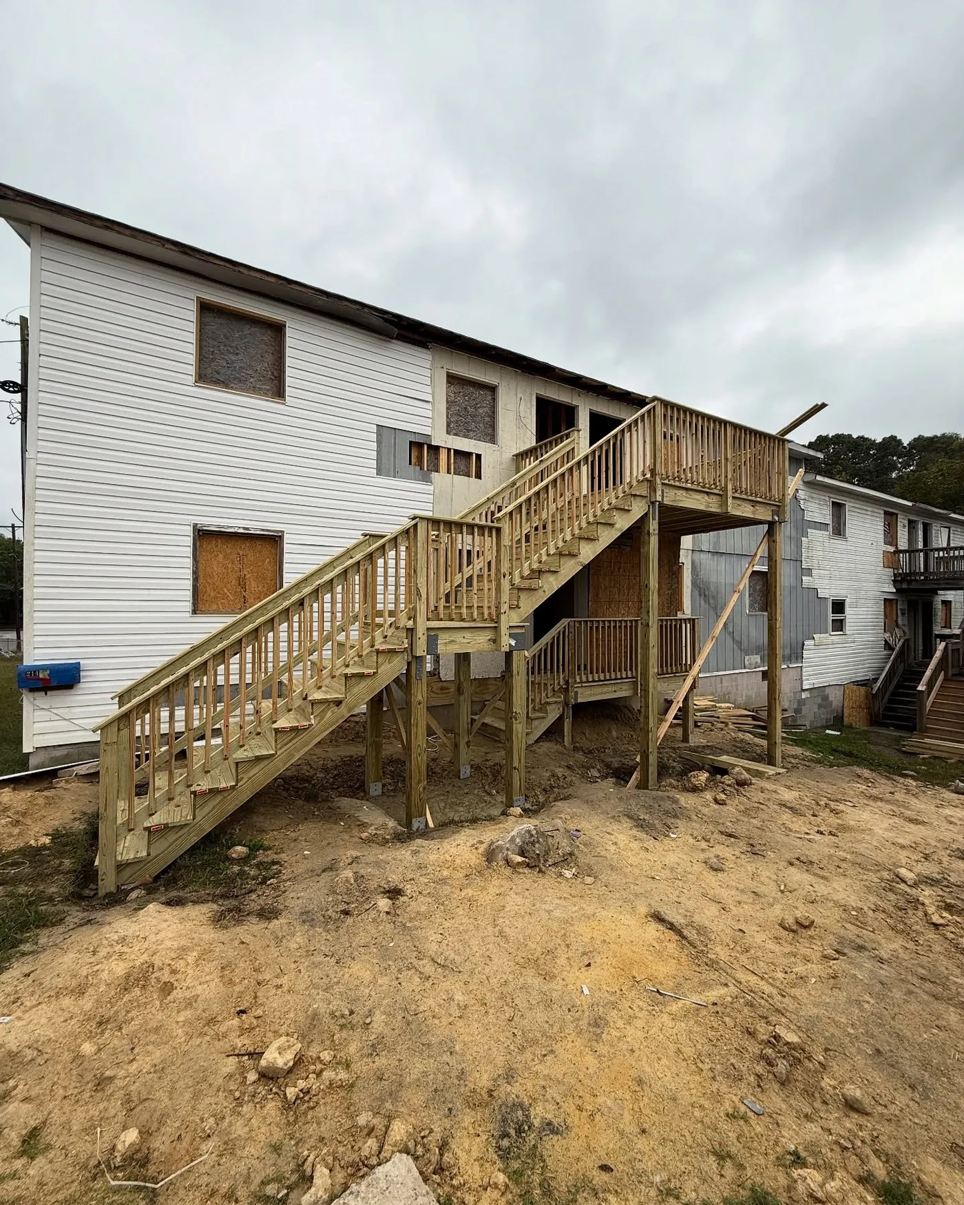 New exterior stairs framed on a two-story building